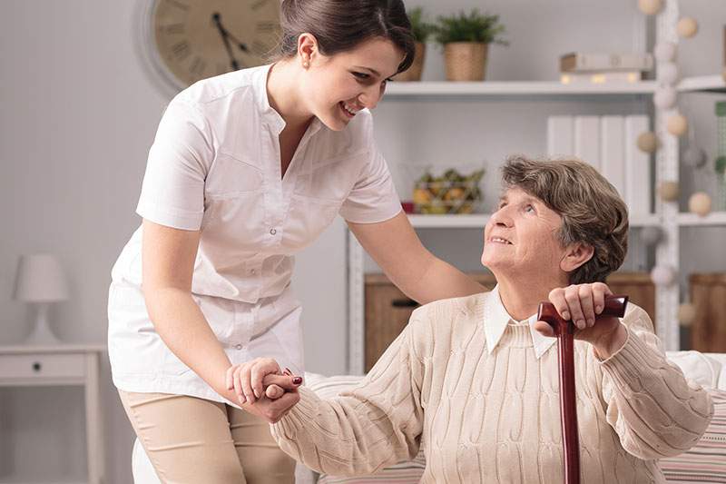 female aid with the elderly woman